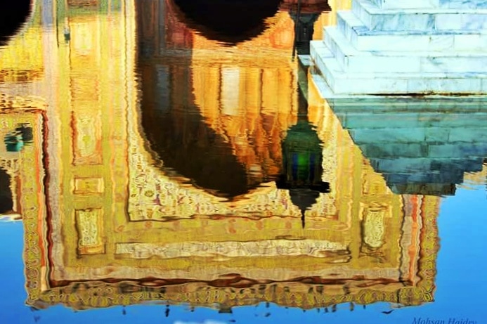 Reflection of Masjid Wazir Khan